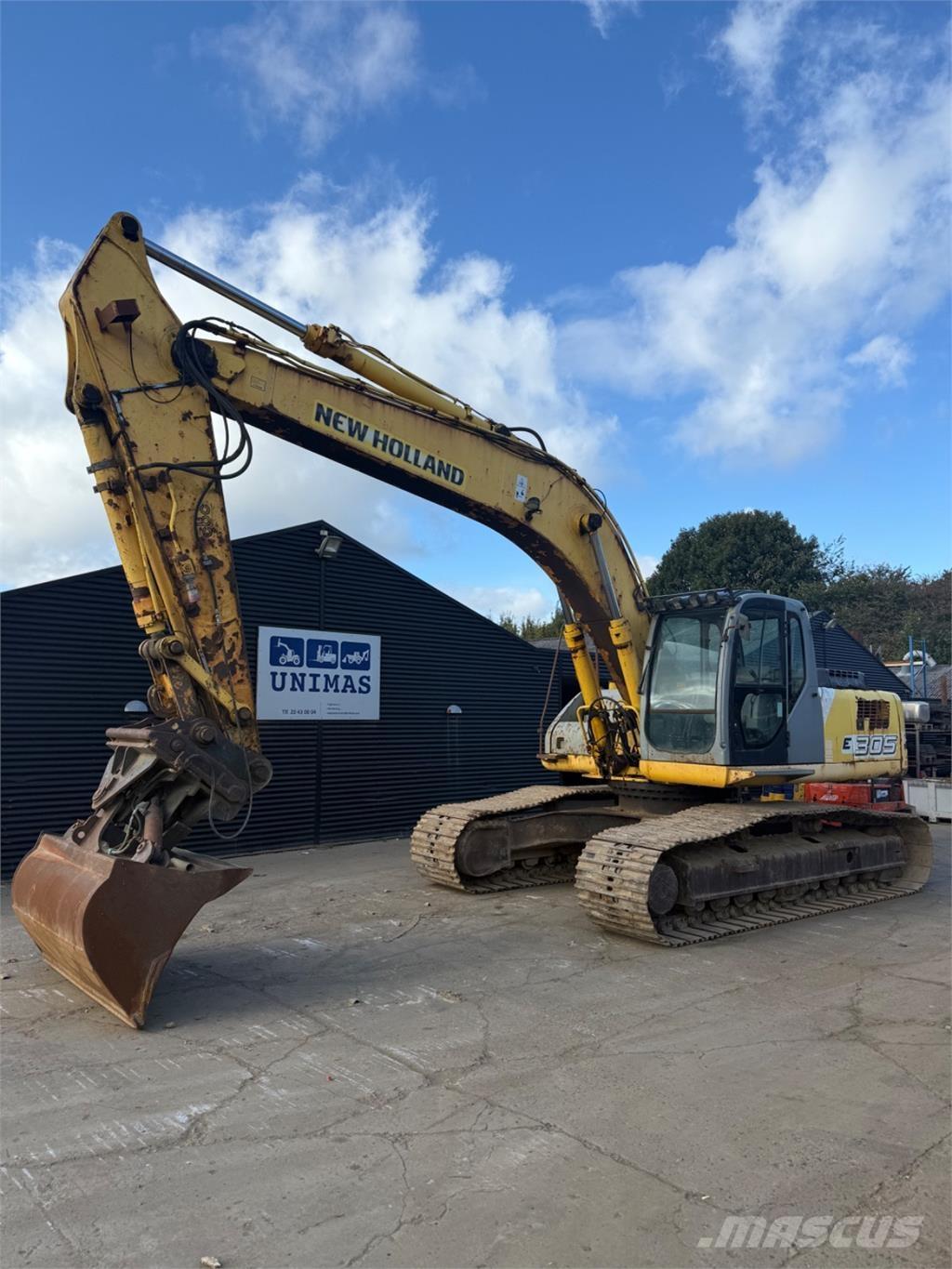 New Holland E305 Kāpurķēžu ekskavatori