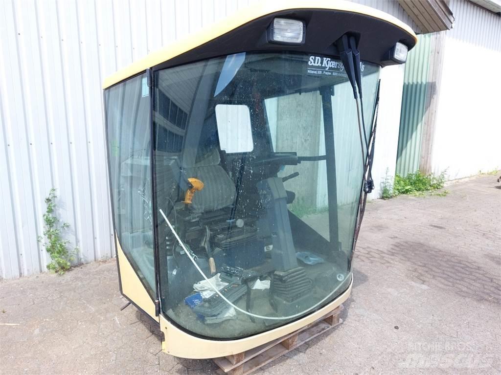 New Holland TX65 Kabīnes un interjers