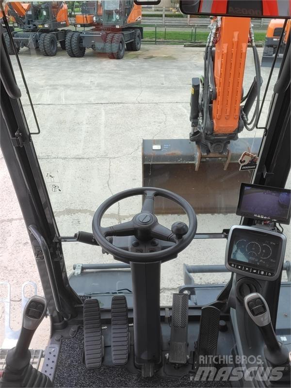 Doosan DX140W-5 Ekskavatori uz riteņiem