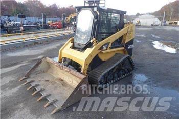 CAT 247B Lietoti riteņu kompaktiekrāvēji