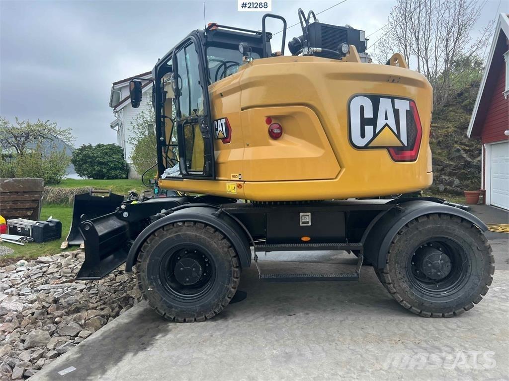 CAT M315 Ekskavatori uz riteņiem