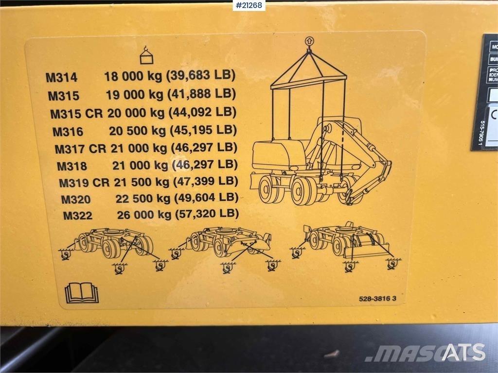 CAT M315 Ekskavatori uz riteņiem