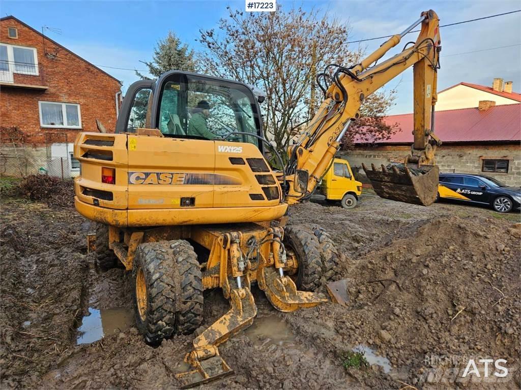 CASE WX125 Ekskavatori uz riteņiem
