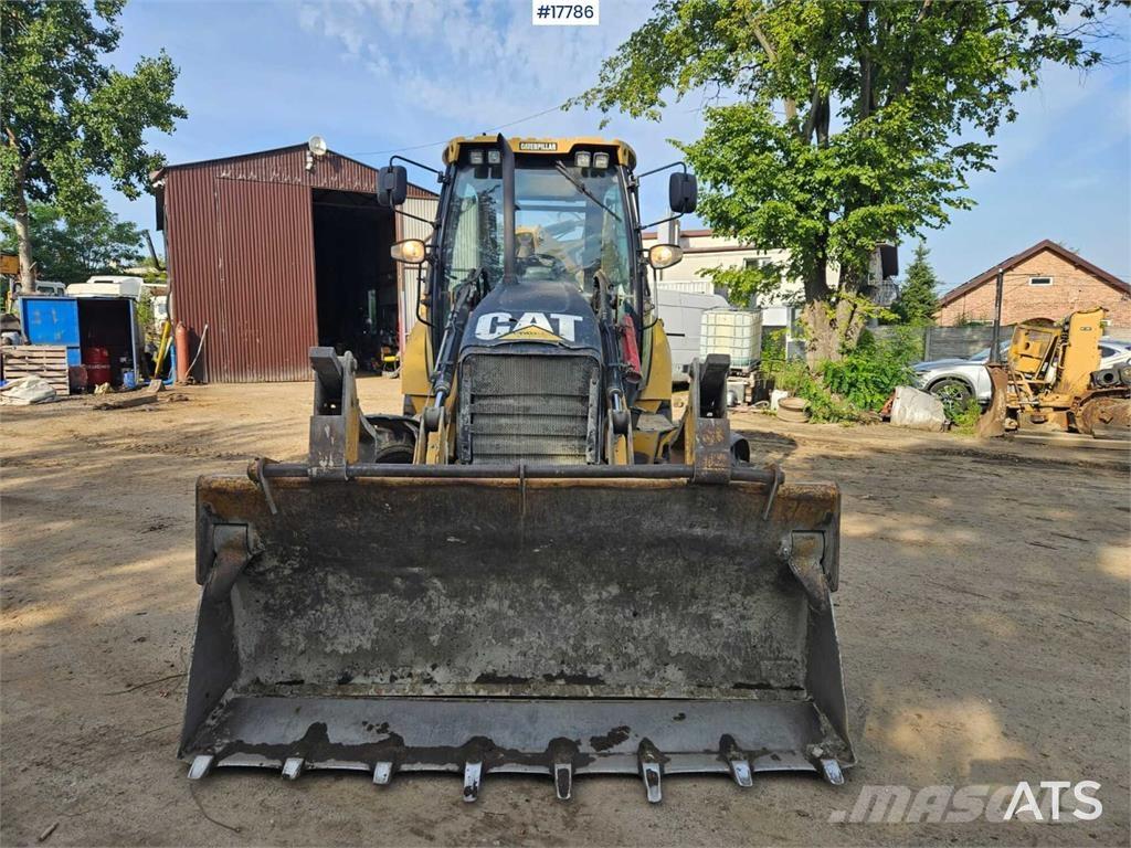 CAT 428E Ekskavatori-iekrāvēji