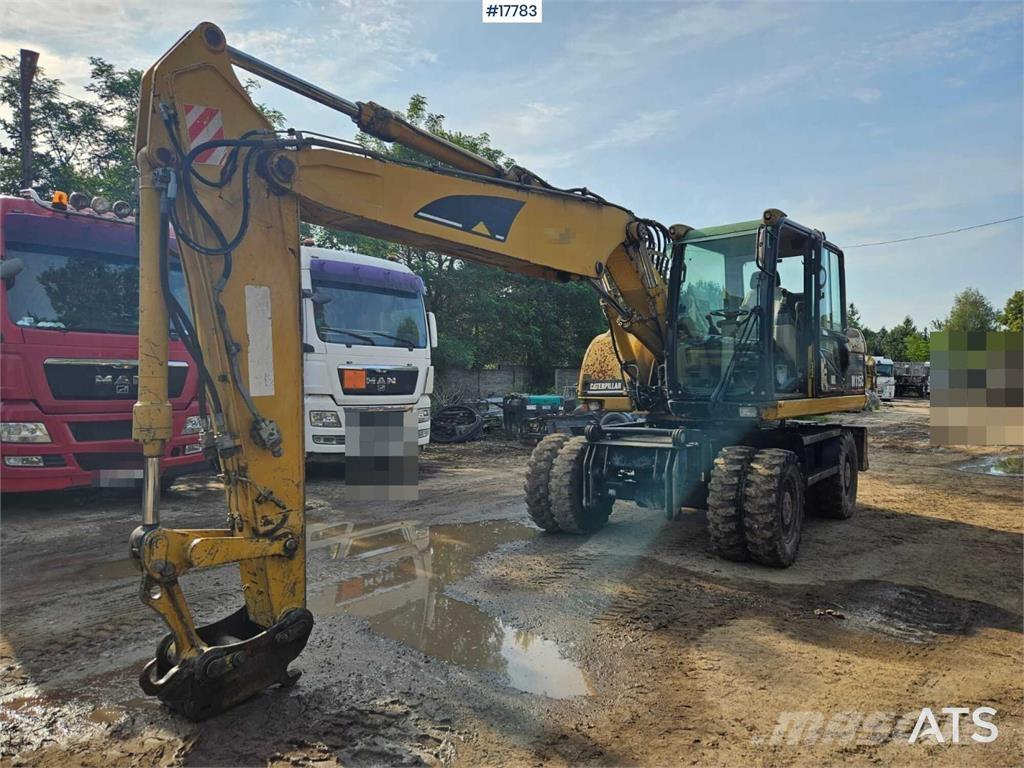 CAT M315C Ekskavatori uz riteņiem