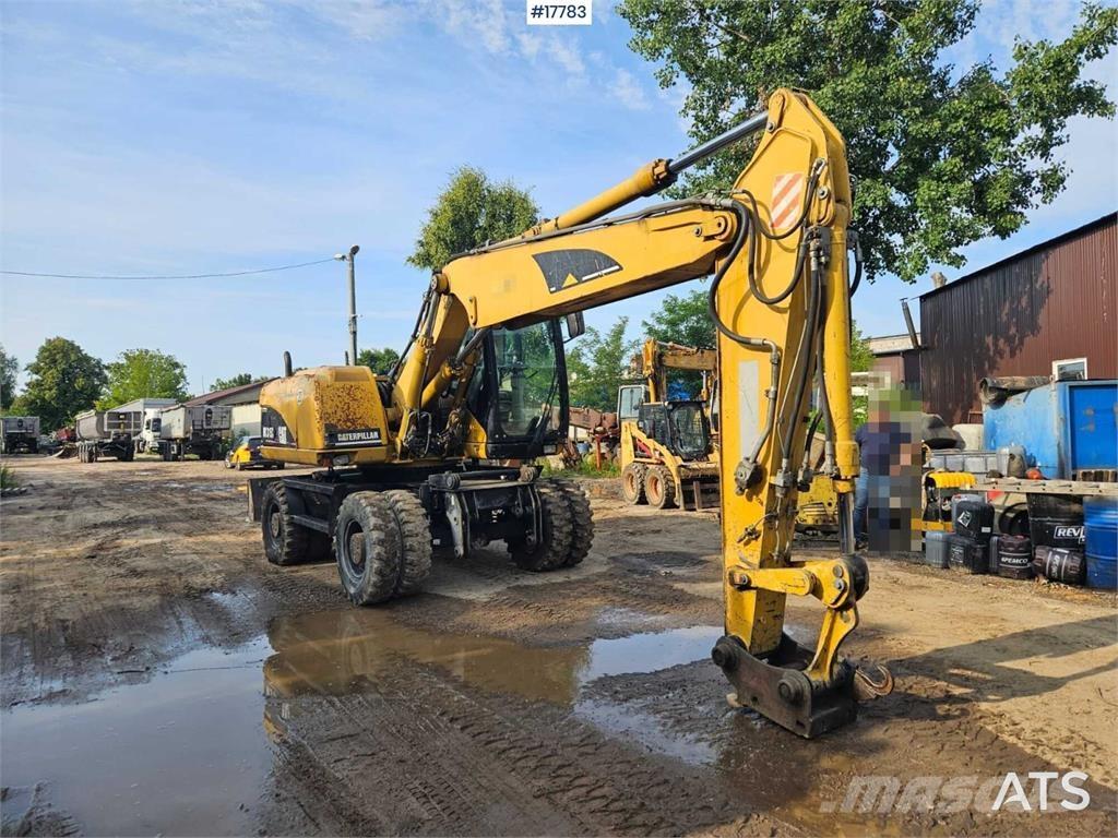 CAT M315C Ekskavatori uz riteņiem
