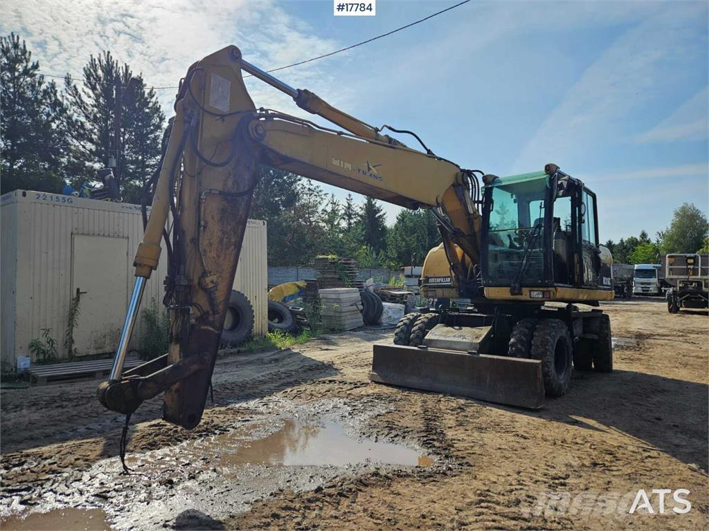CAT M316C Ekskavatori uz riteņiem