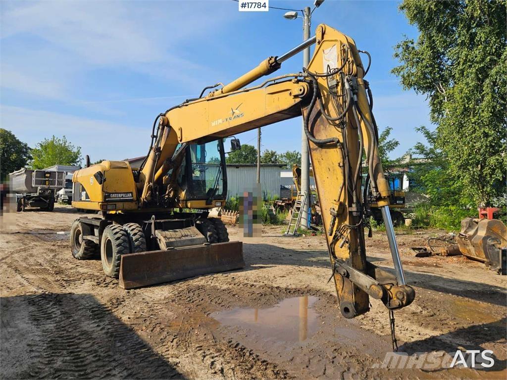 CAT M316C Ekskavatori uz riteņiem