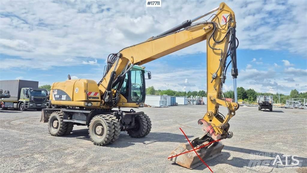 CAT M316D Ekskavatori uz riteņiem