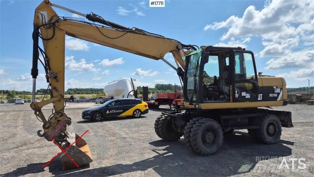 CAT M316D Ekskavatori uz riteņiem