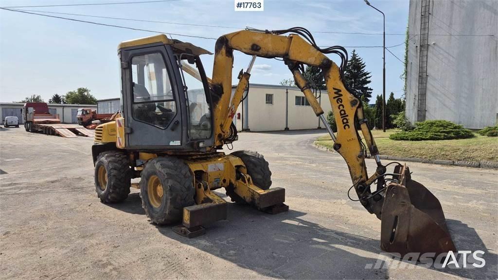 Mecalac 12MX Ekskavatori uz riteņiem