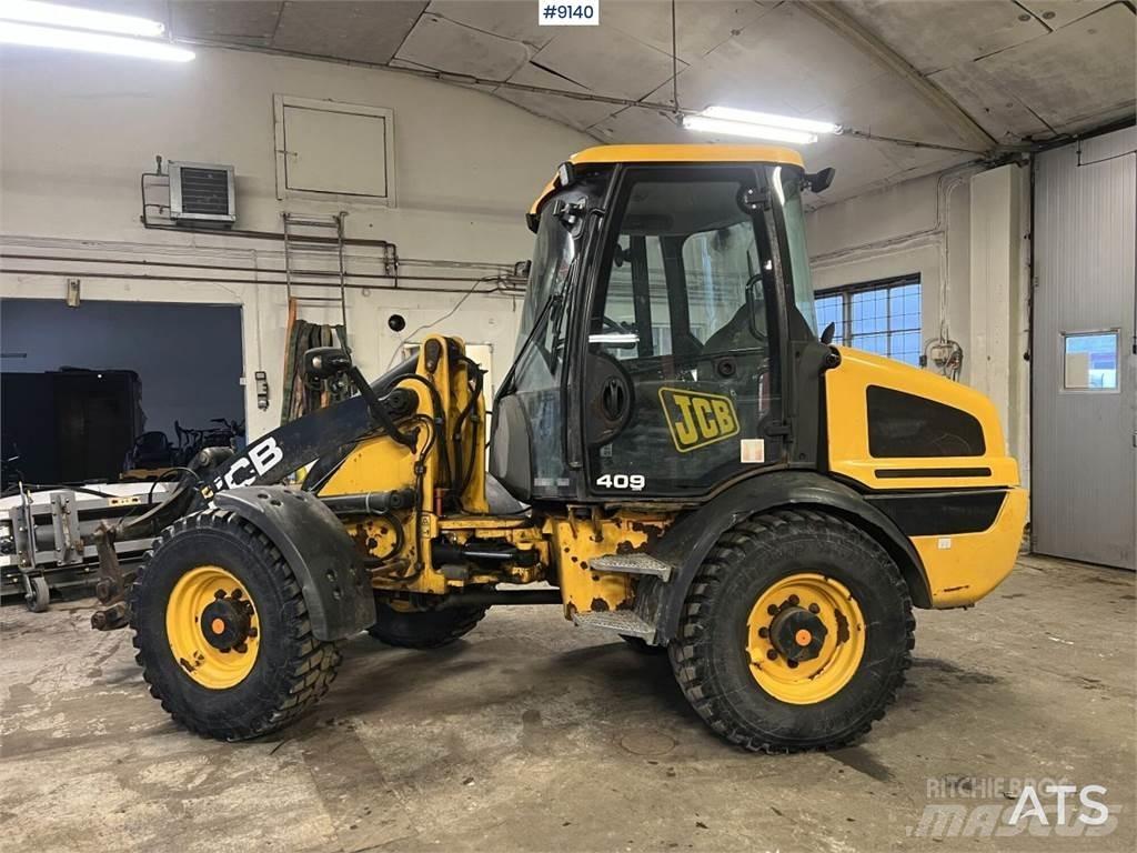 JCB 409 T4 Riteņu buldozeri