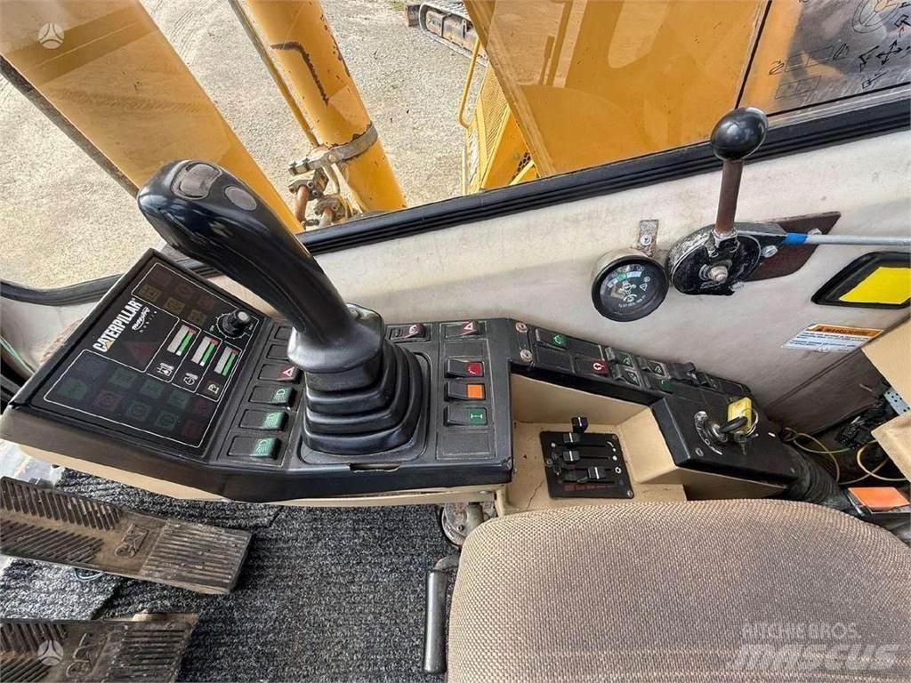 CAT M 315 Ekskavatori uz riteņiem
