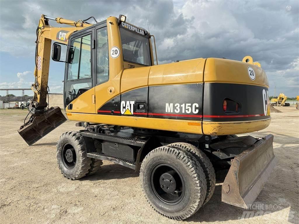 CAT M315C Ekskavatori uz riteņiem