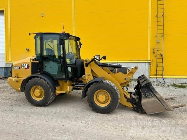 CAT 906M Iekrāvēji uz riteņiem