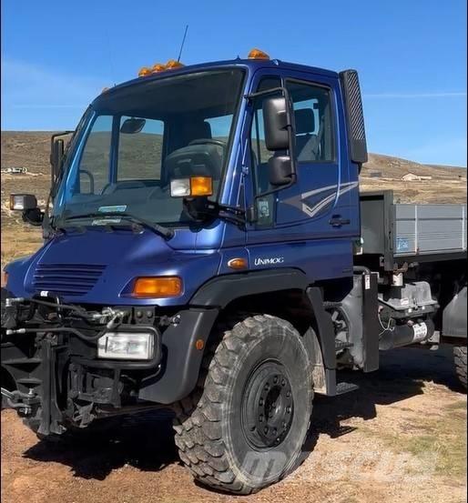  UNIMG FLBTK Platformas/izkraušana no sāniem