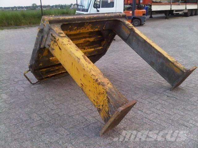 CAT 990 II Šasija un piekare