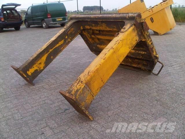 CAT 990 II Šasija un piekare