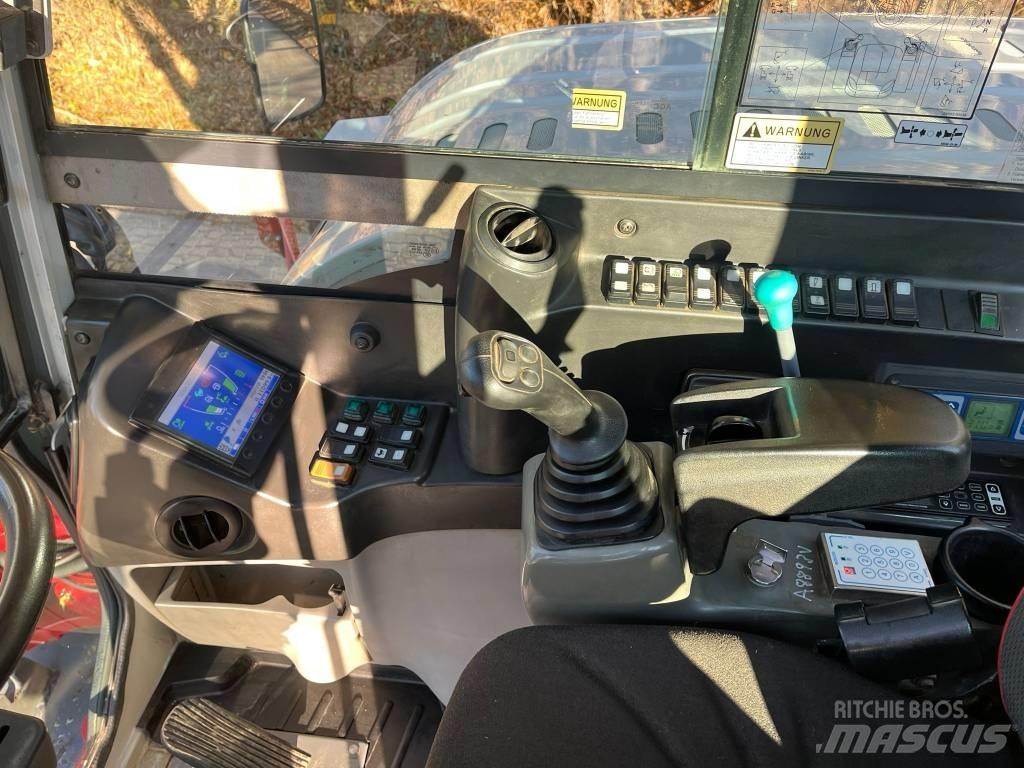 Takeuchi TB295W Ekskavatori uz riteņiem