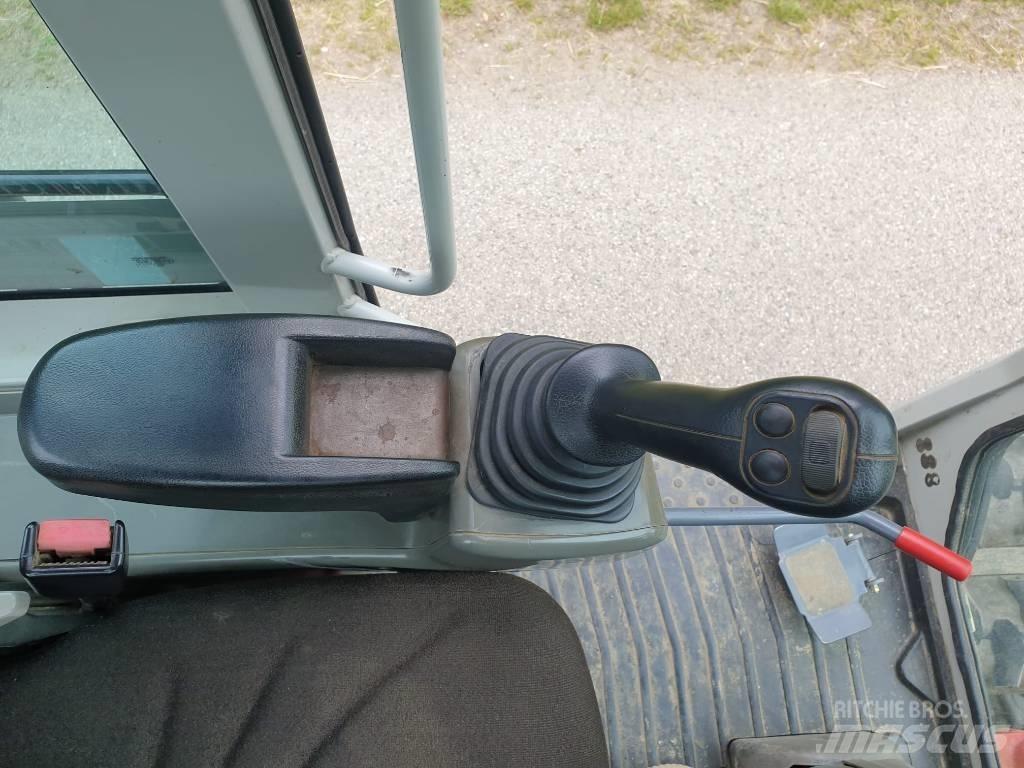 Takeuchi TB295W Ekskavatori uz riteņiem
