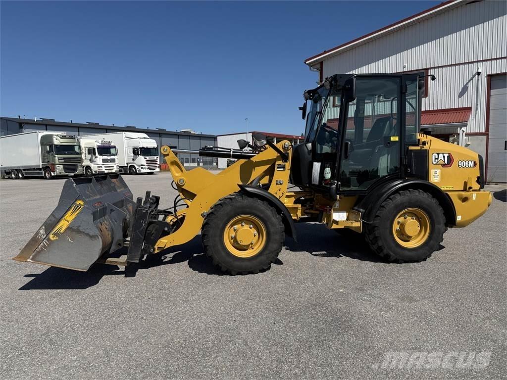 CAT 906M Iekrāvēji uz riteņiem