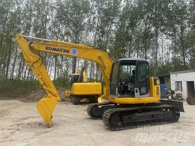Komatsu PC128US Kāpurķēžu ekskavatori