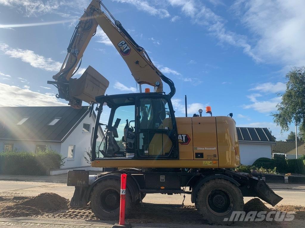 CAT M314 Ekskavatori uz riteņiem