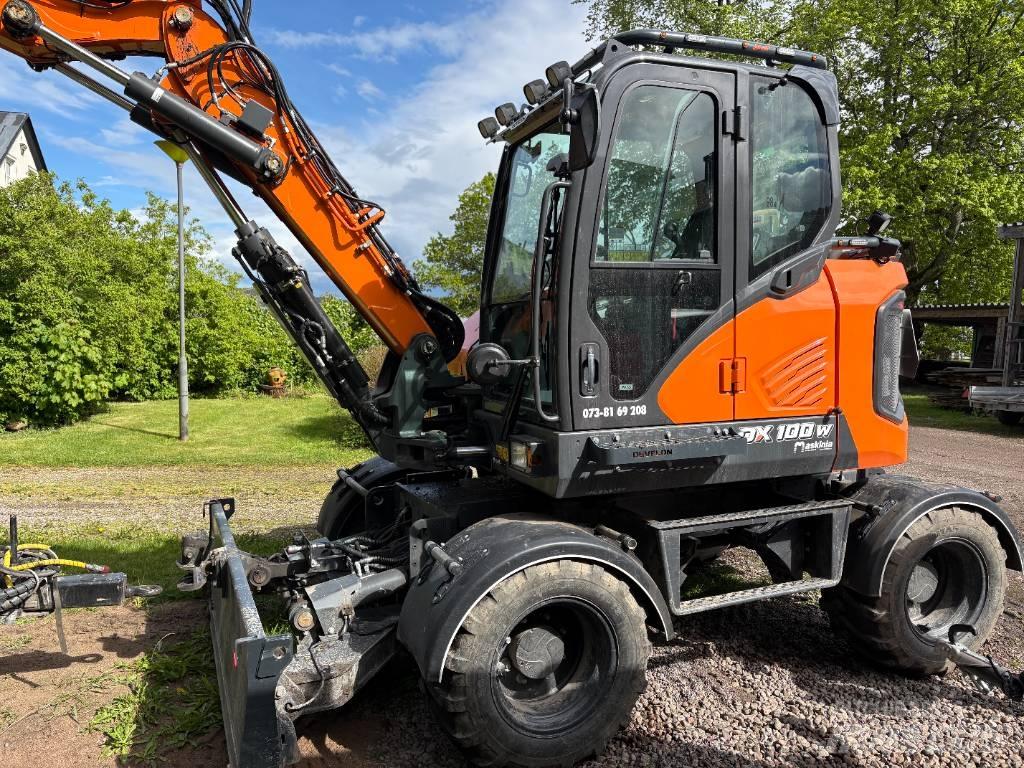 Develon DX 100 W-7 Ekskavatori uz riteņiem