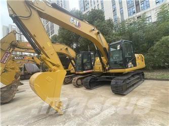 CAT 2021 CAT 323Gx Ekskavatori uz riteņiem
