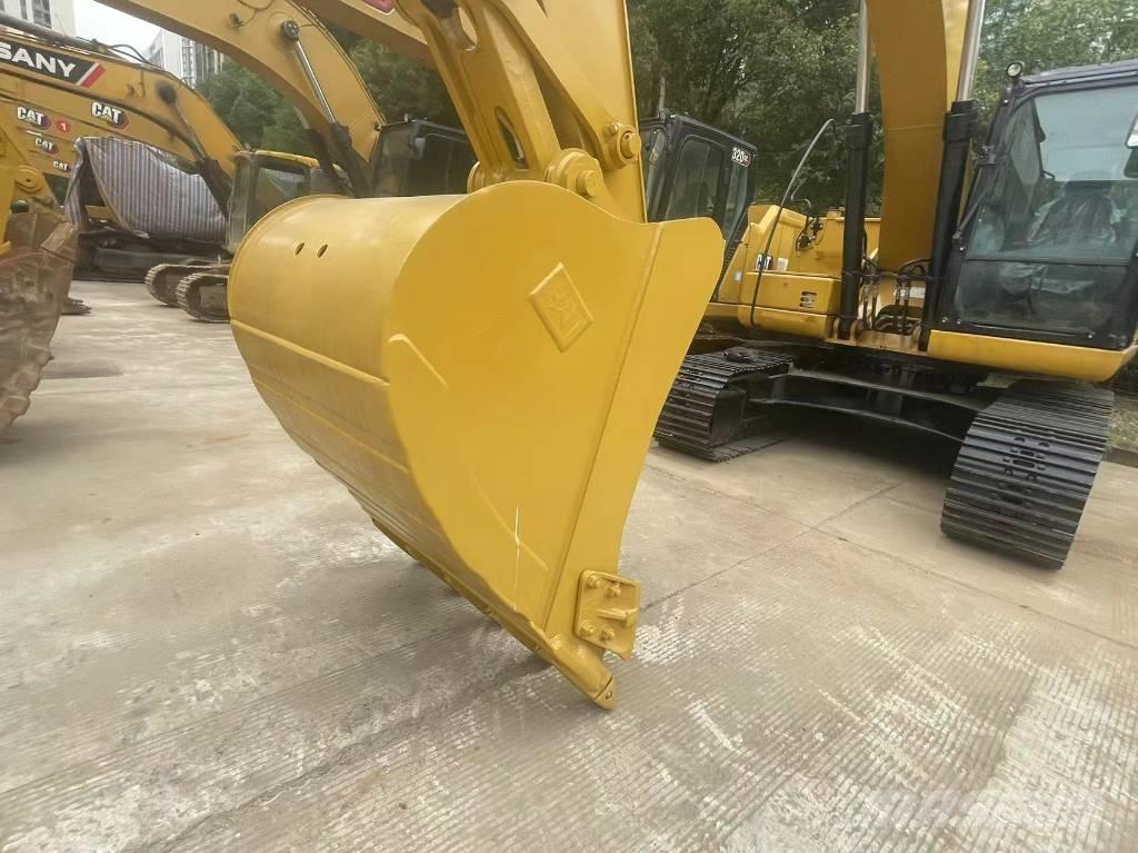 CAT 2021 CAT 323Gx Ekskavatori uz riteņiem