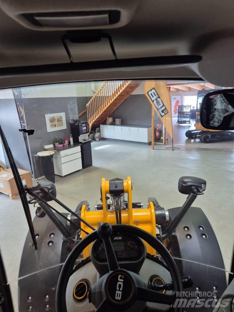 JCB 409 Iekrāvēji uz riteņiem