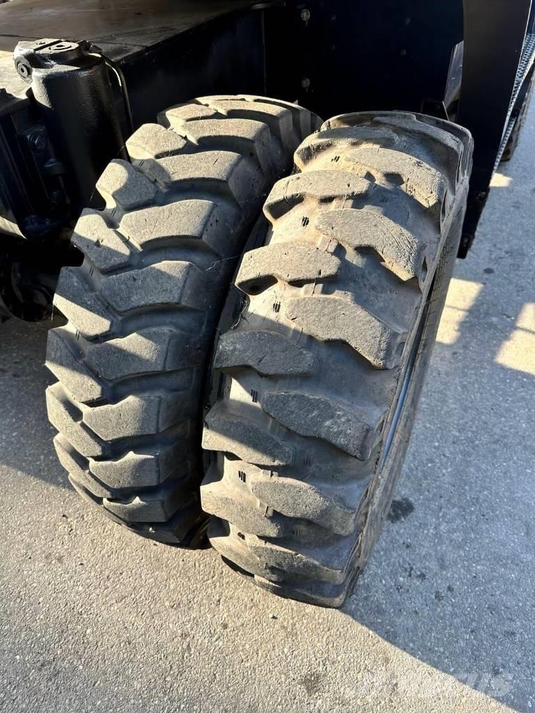 CAT M 318 F Ekskavatori uz riteņiem
