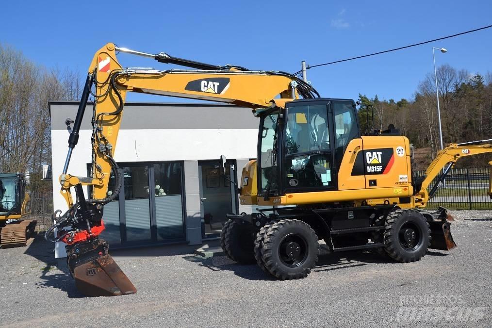 CAT M 315 F Ekskavatori uz riteņiem