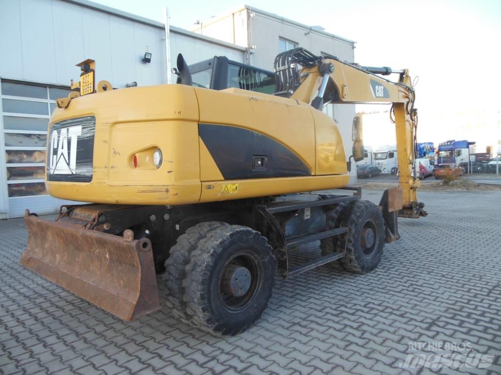 CAT M 316 D Ekskavatori uz riteņiem