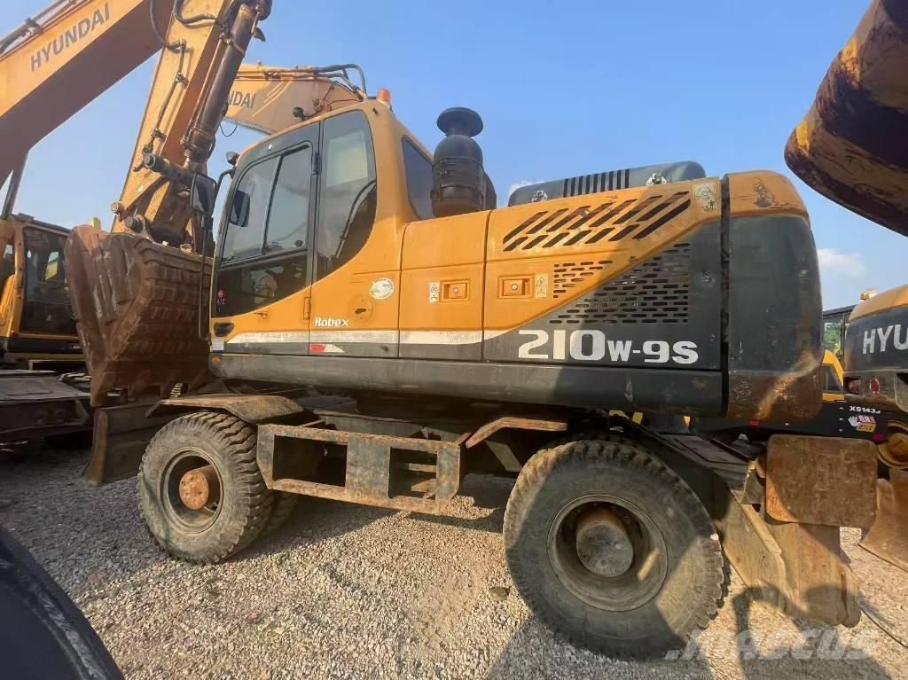 Hyundai 210W-9 Ekskavatori uz riteņiem