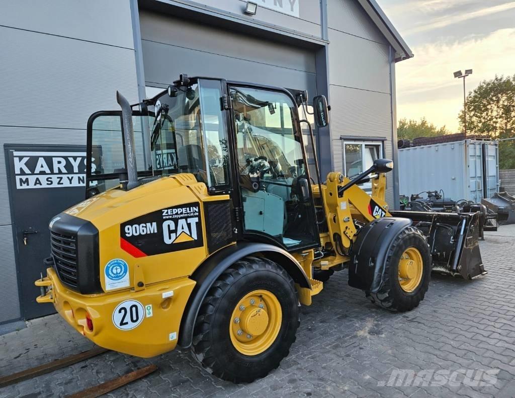 CAT 906 Iekrāvēji uz riteņiem