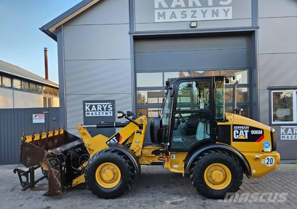 CAT 906 Iekrāvēji uz riteņiem