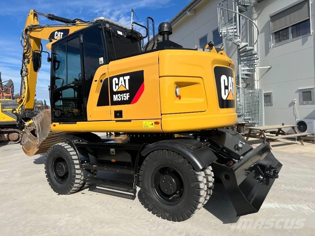 CAT M 315 F Ekskavatori uz riteņiem