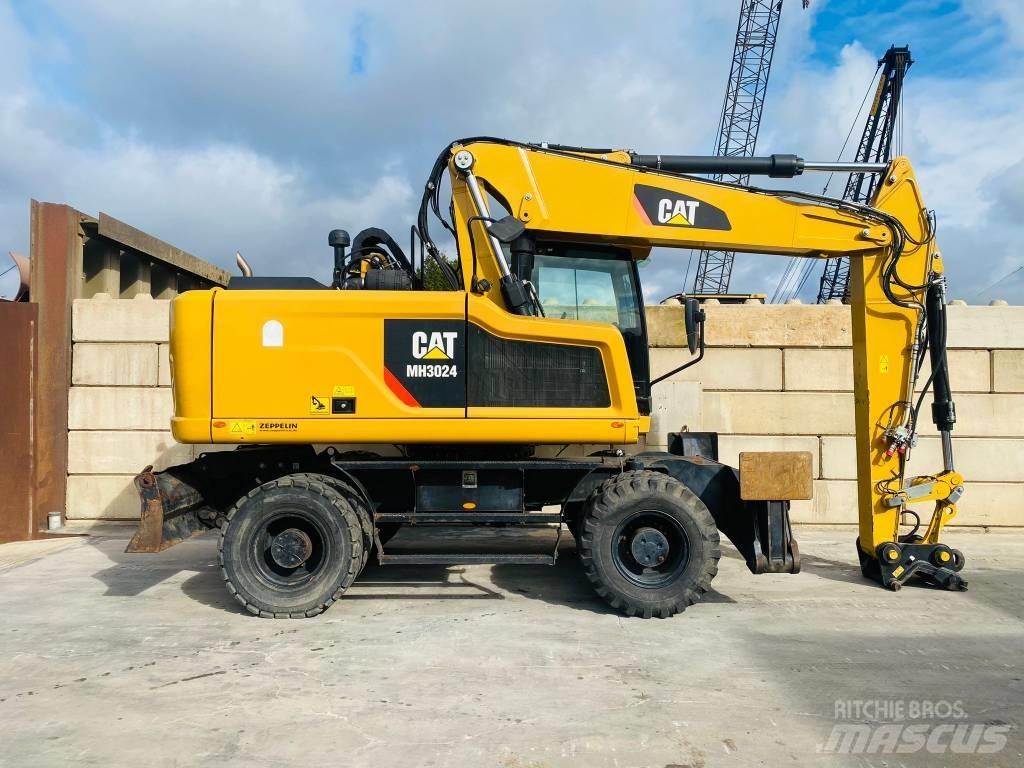 CAT mh3024 Ekskavatori uz riteņiem