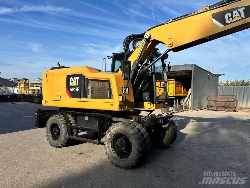CAT M 318 F Ekskavatori uz riteņiem