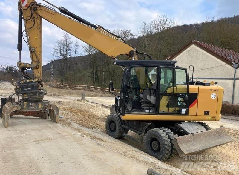 CAT M316F Ekskavatori uz riteņiem