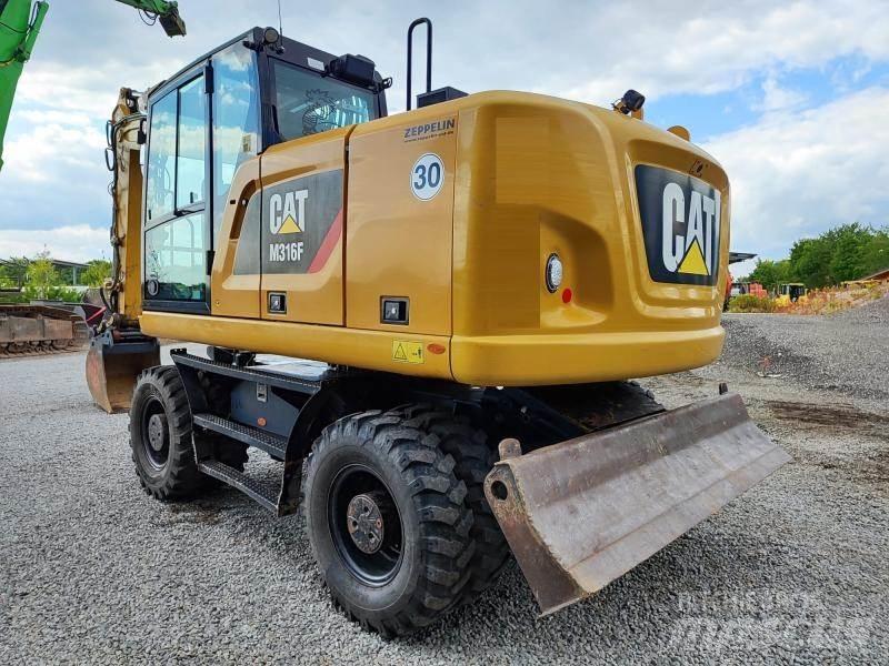 CAT M316F Ekskavatori uz riteņiem