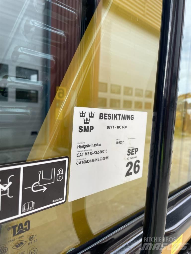 CAT M 315 Ekskavatori uz riteņiem