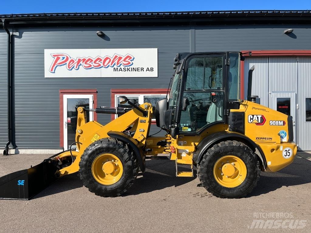 CAT 908M-22 1670Tim Iekrāvēji uz riteņiem