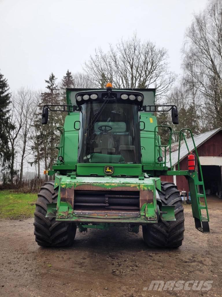 John Deere T 560 Ražas novākšanas kombaini