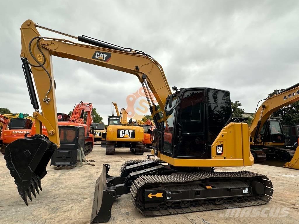 CAT 310 Kāpurķēžu ekskavatori