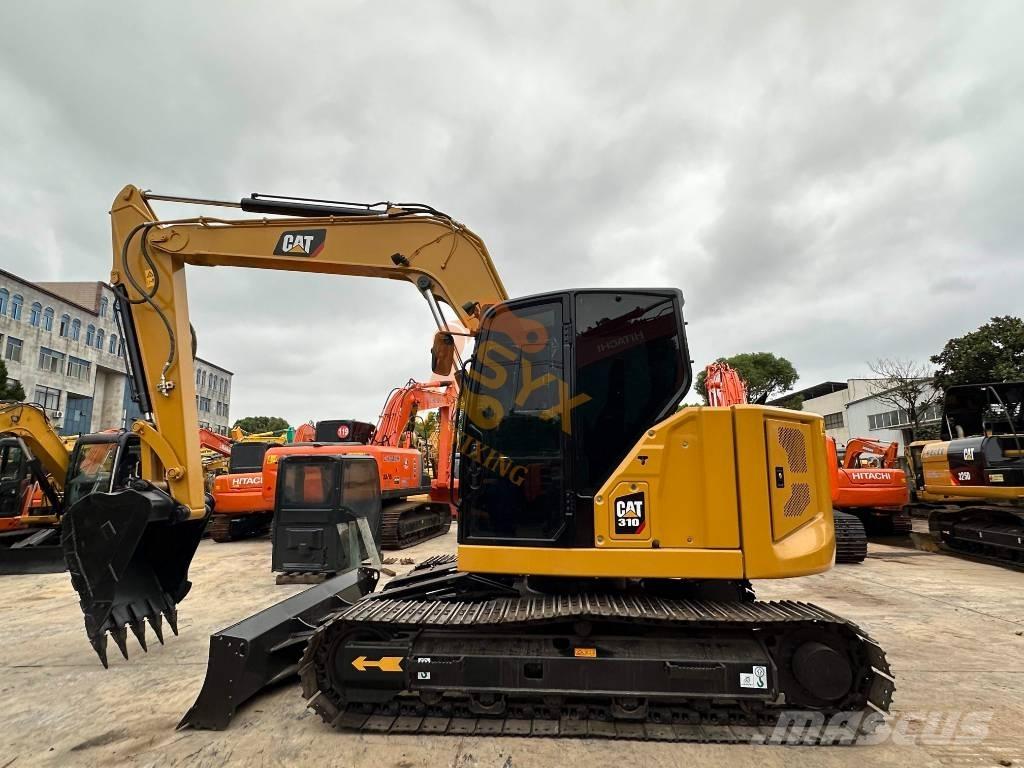 CAT 310 Kāpurķēžu ekskavatori