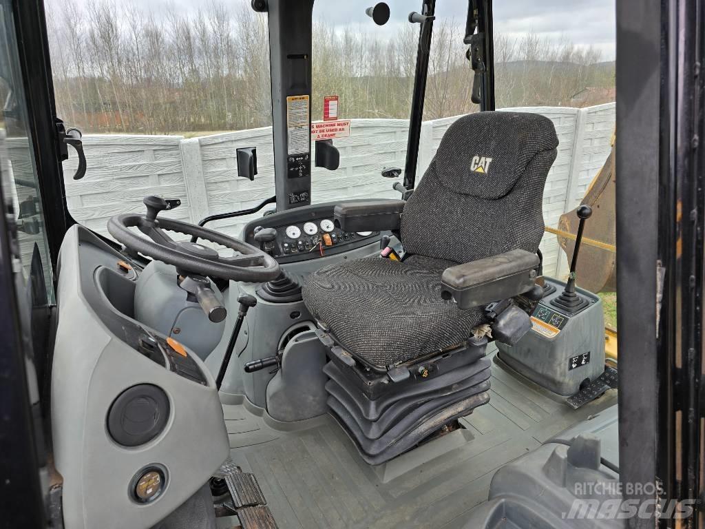 CAT 428 D Ekskavatori-iekrāvēji