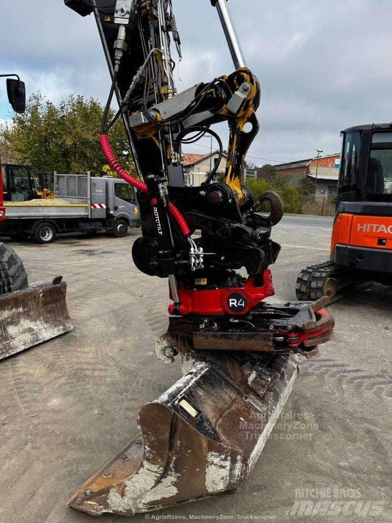 CAT 315 Ekskavatori uz riteņiem