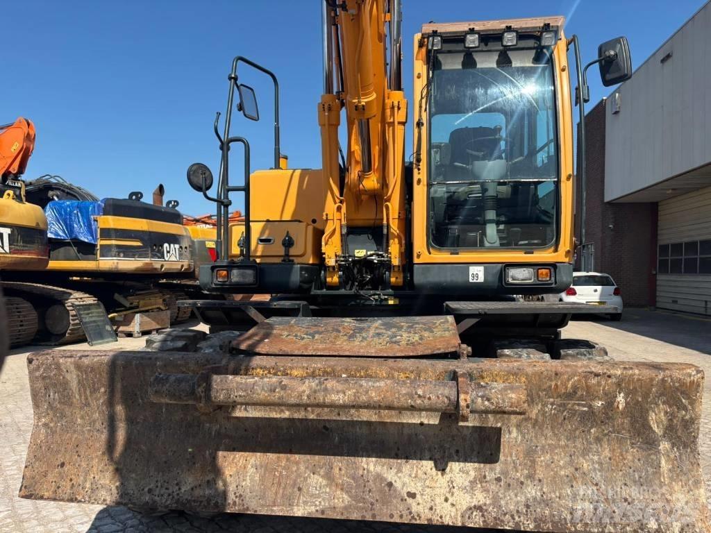 Hyundai 140W-9A Ekskavatori uz riteņiem
